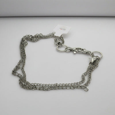 Silver chain bracelet on a light gray background